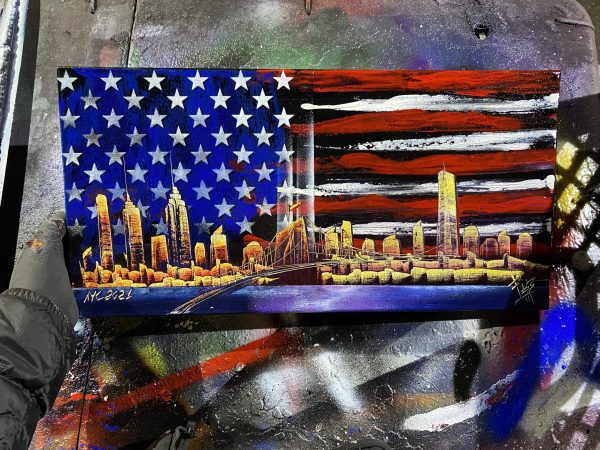 New York skyline artwork with an American flag